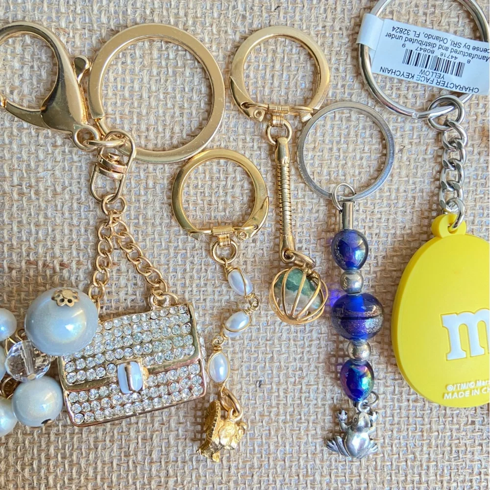 Lot of key chains rings with faux pearls bag airplane teacher in mixed tones